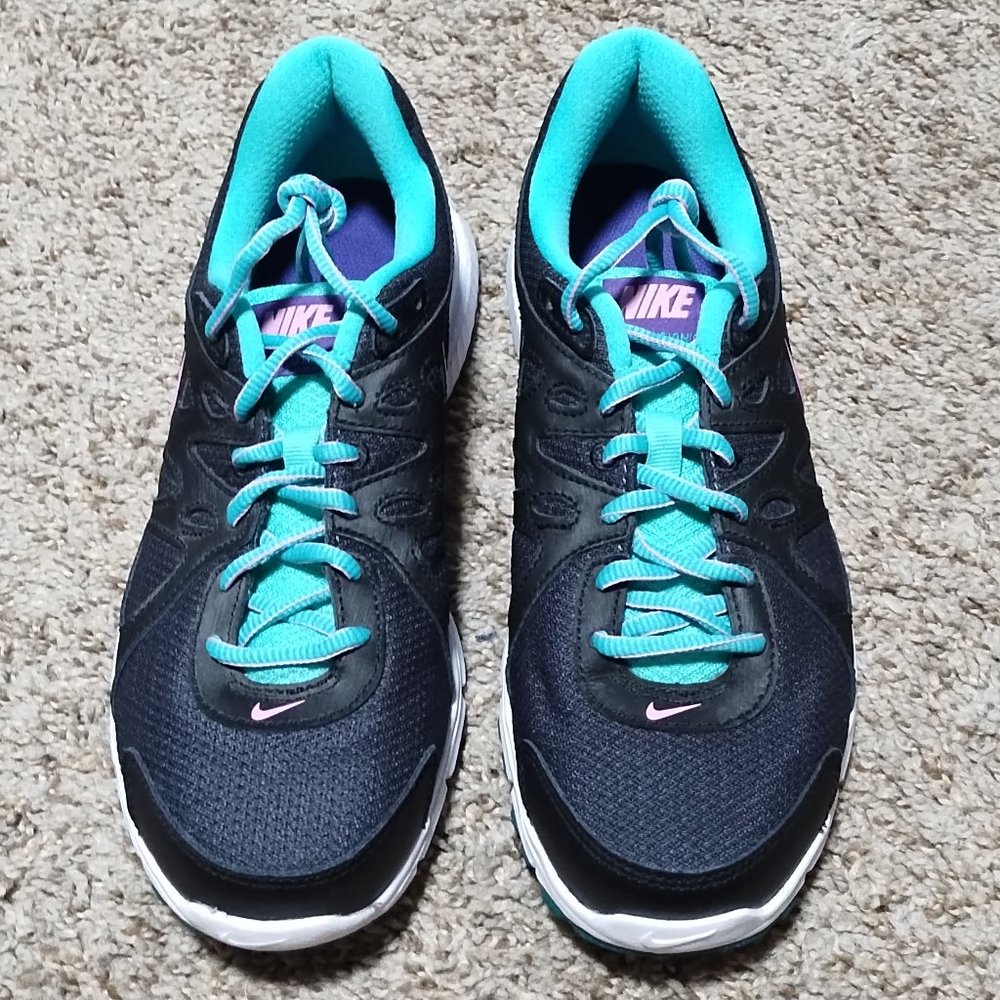 Women's Nike Revolution 2 NWOB Size US 8.5. Retail $54.99.